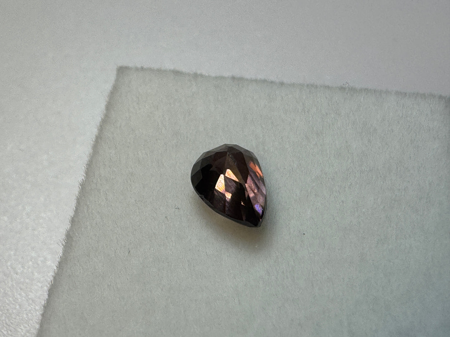 Pink and Purple Color Change Teardrop Shape Spinel (7x5mm, 1.1 carats)