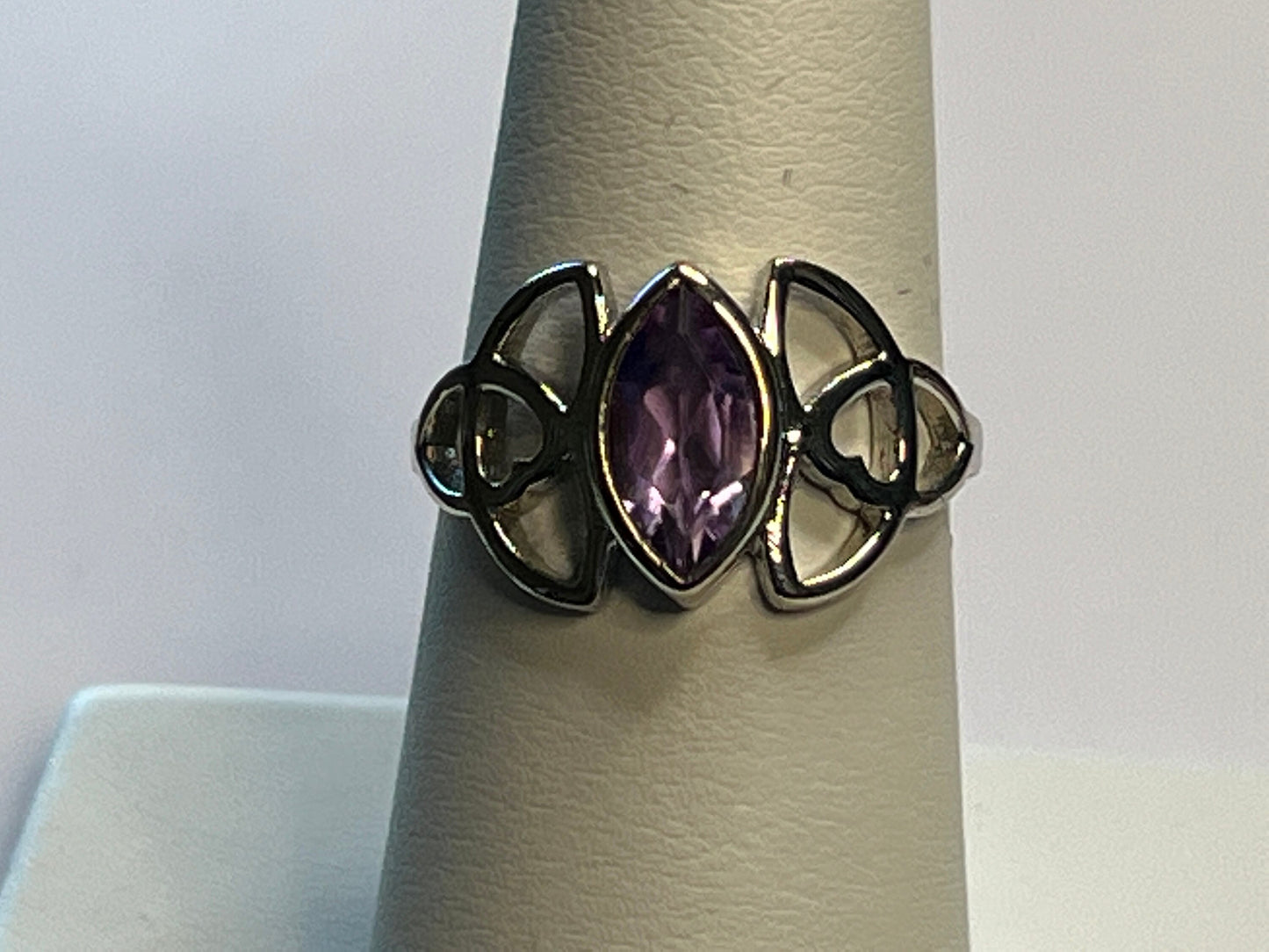 Glowing Amethyst Sterling Silver Ring in a Heart Stylized Setting