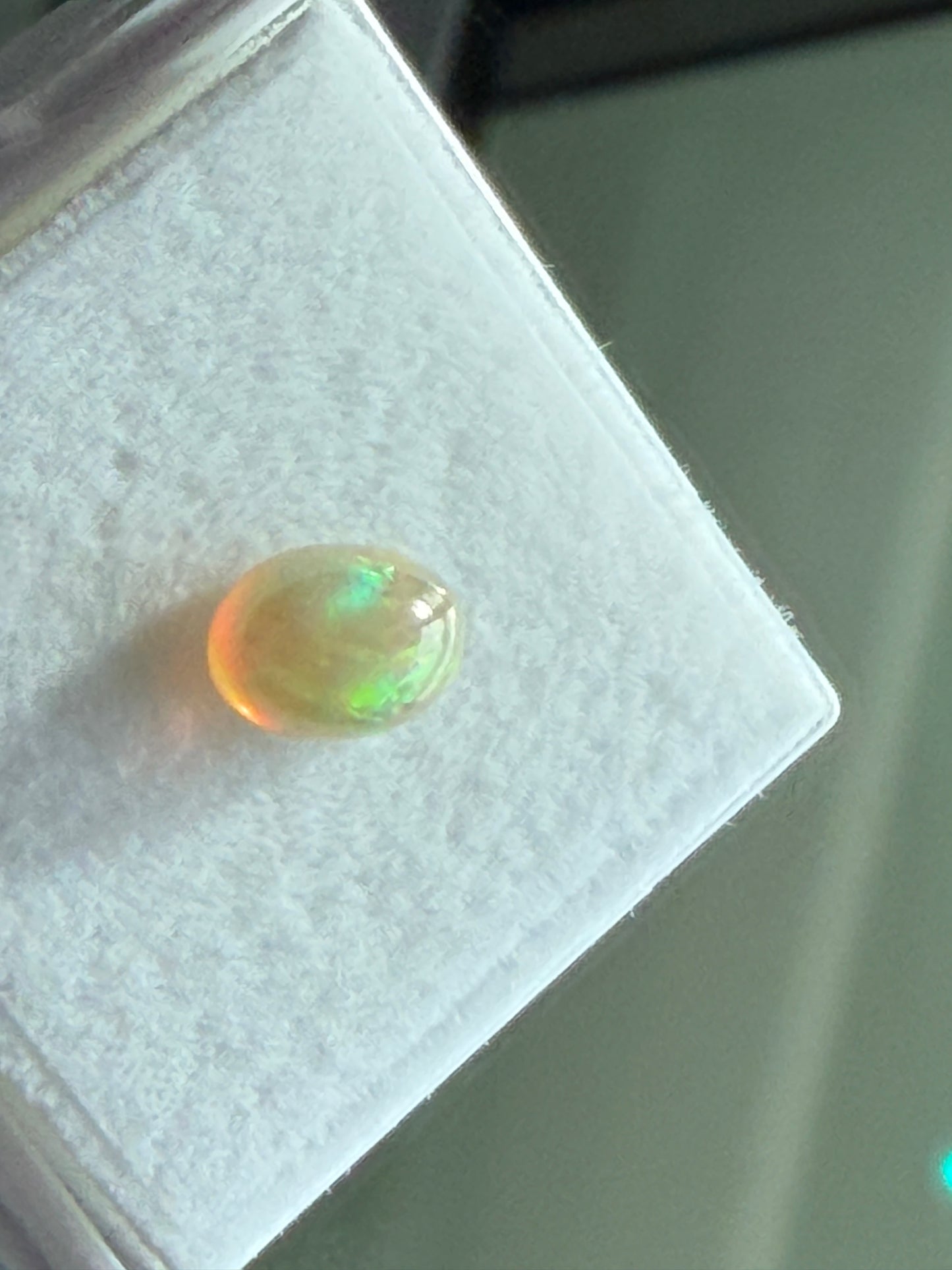 Natural Ethiopian Opal 0.65ct Oval Cabochon • 7x5mm • Honey Fire Opal