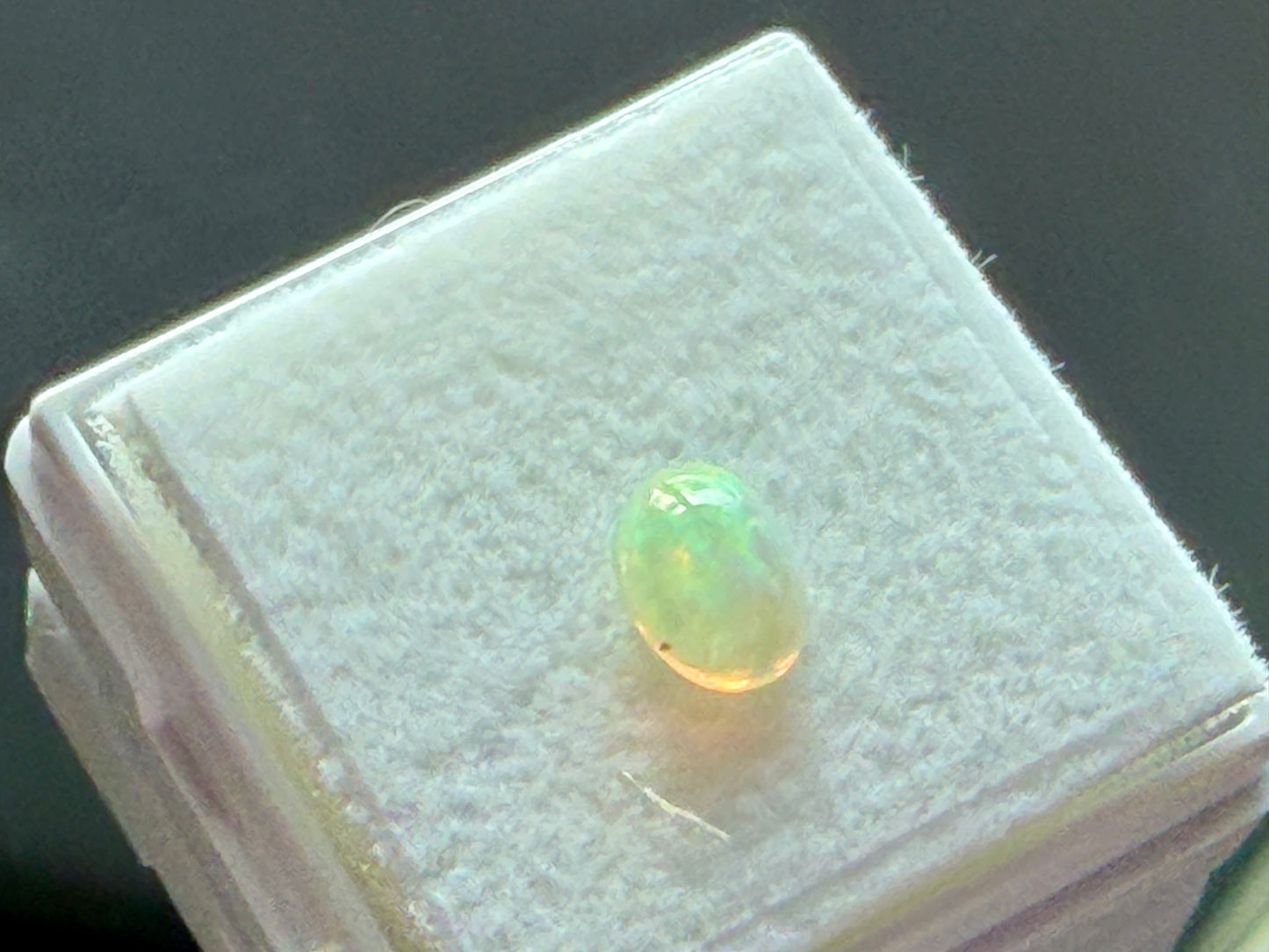 Ethiopian Opal – 7×5 mm Oval Cabochon (0.35 Carat)