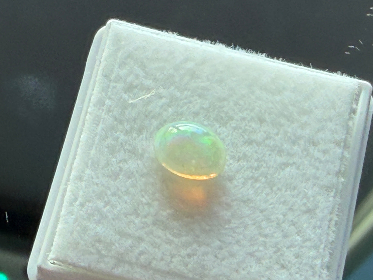 Ethiopian Opal – 7×5 mm Oval Cabochon (0.35 Carat)