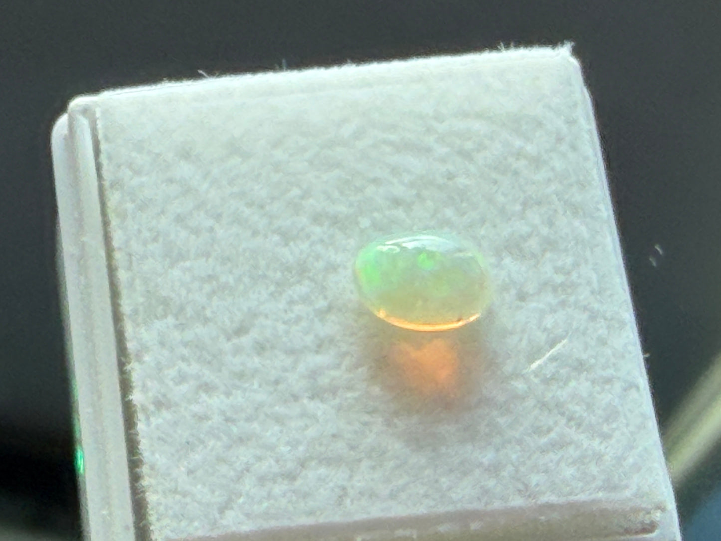 Ethiopian Opal – 7×5 mm Oval Cabochon (0.35 Carat)
