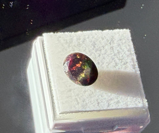 Smoked Ethiopian Opal 1.30ct • 10x8mm Oval Faceted • Intense Fire & Color Play